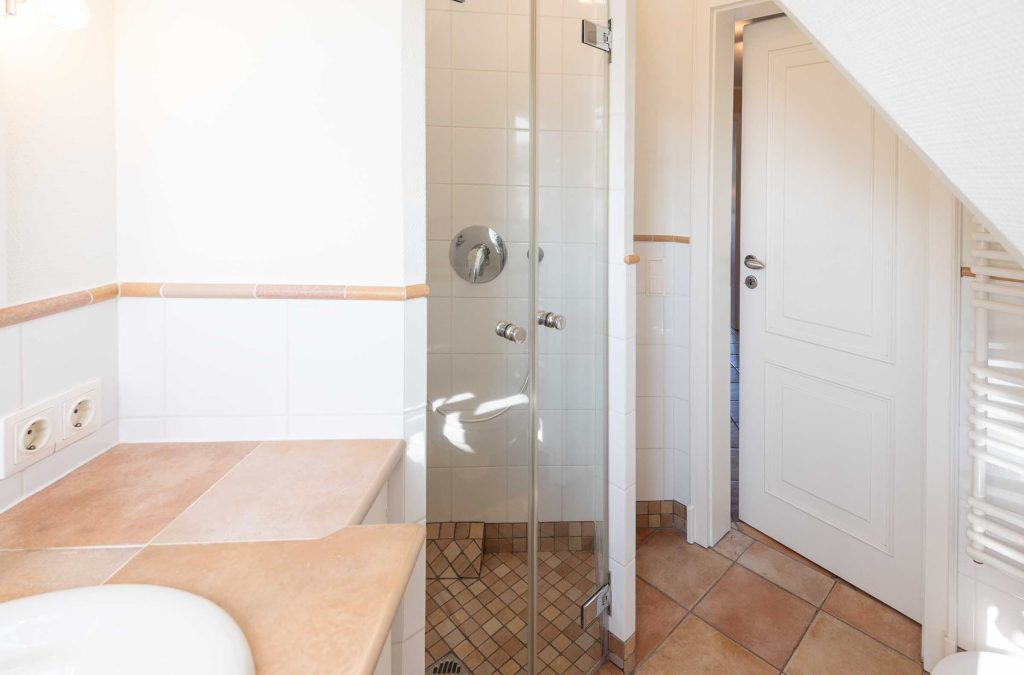 im Badezimmer im Haus Carmen App. 12 befindet sich ein Handtuchtrockner